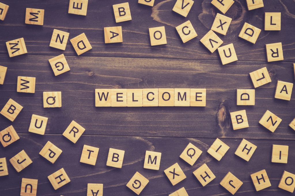 Welcome words surrounded with scrambled letters